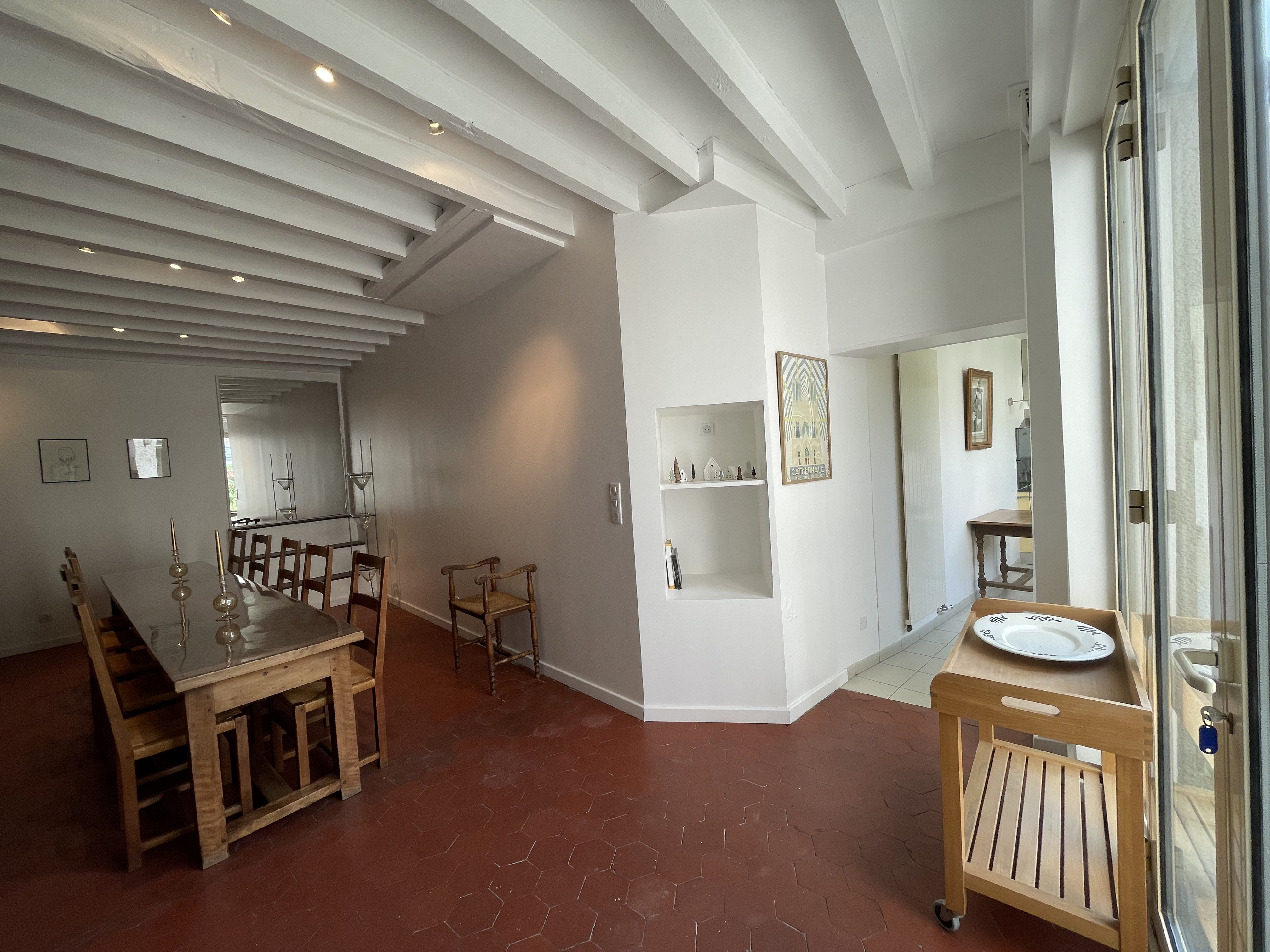 Photo of rows of school desk chairs in a classroom.
