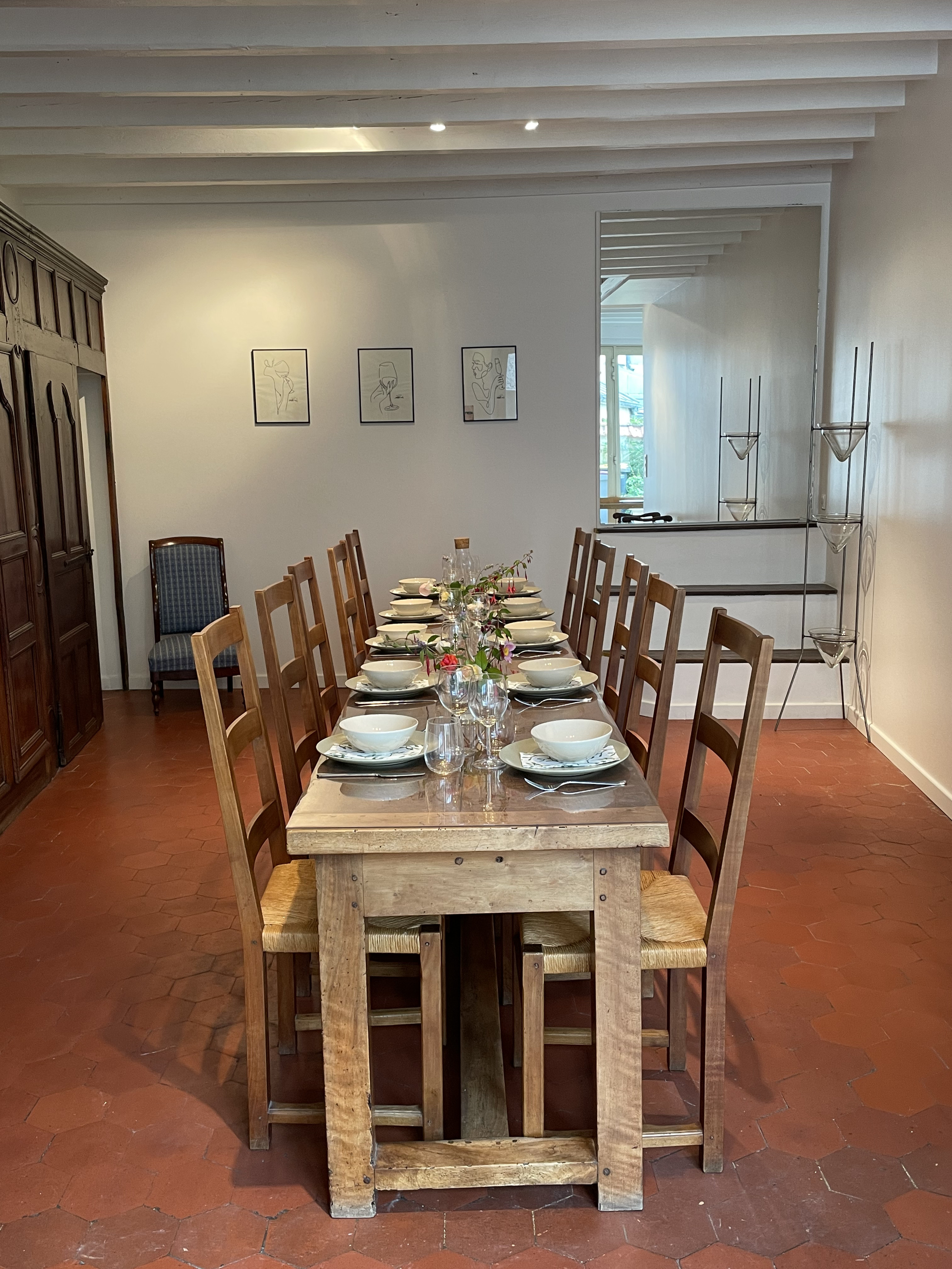Photo of rows of school desk chairs in a classroom.